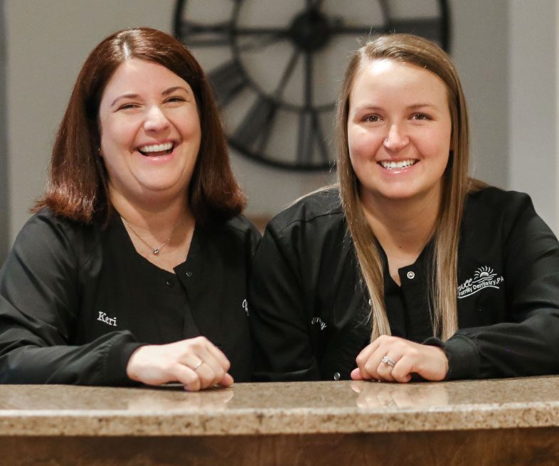 Two Women Smiling